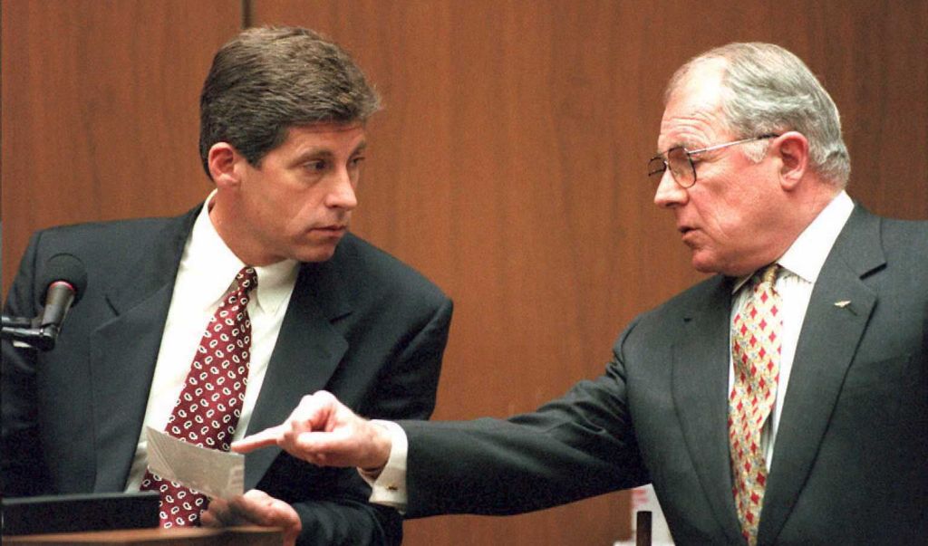 Los Angeles Police Detective Mark Fuhrman(L) on th