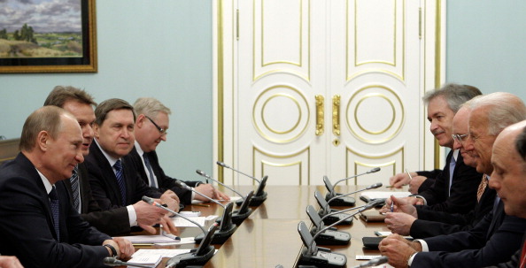 Russian Prime Minister Vladimir Putin (L
