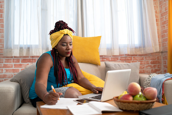Afro woman working from home