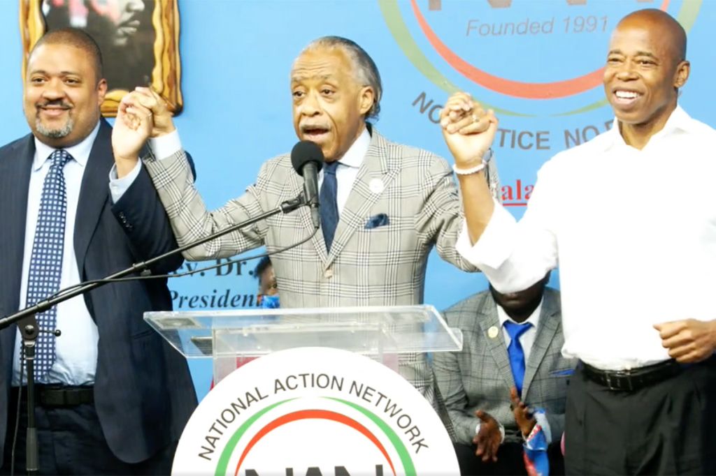 Alvin Bragg and Eric Adams with Al Sharpton at NAN HQ