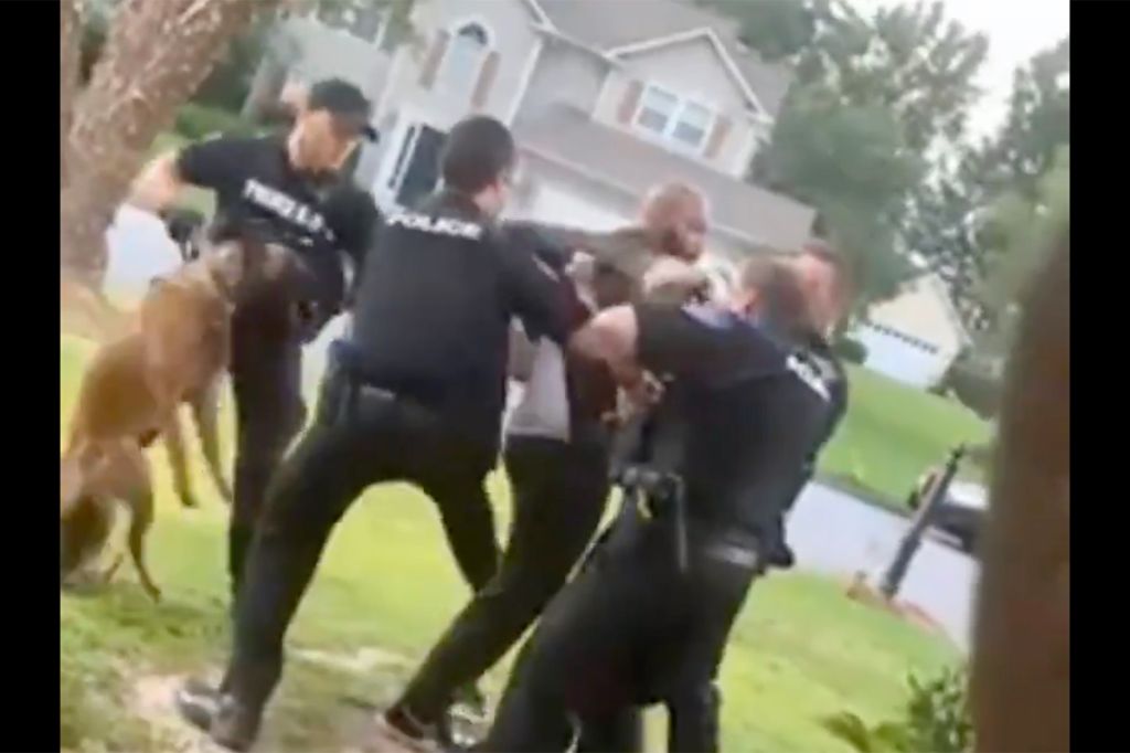 Travis Moya being attacked by Alpharetta PD K-9