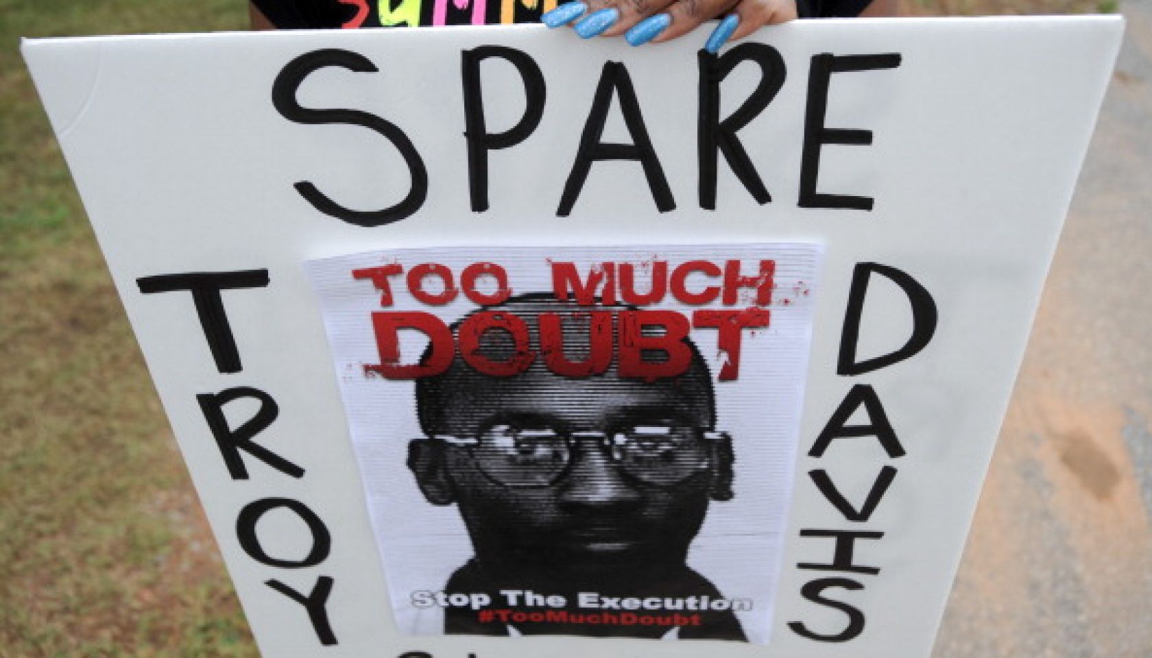 Brittany Stokes of McDonough holds a sig