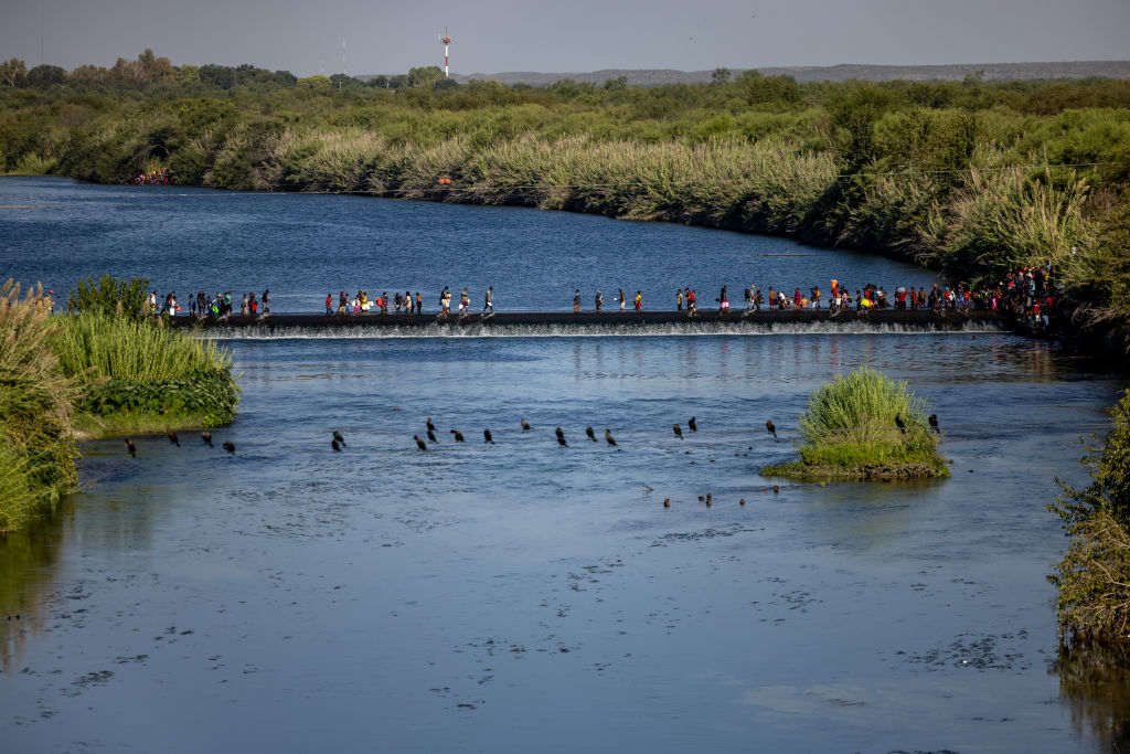 Large Migration Surge Crosses Rio Grande Into Del Rio, Texas