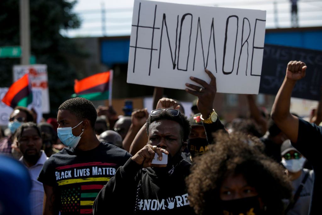 KENOSHA, WI - AUGUST 29: Demonstrators protest the police shoot