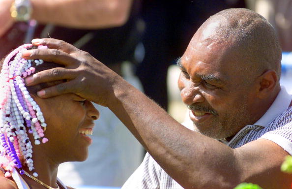 US tennis player Serena Williams (L) is congratula
