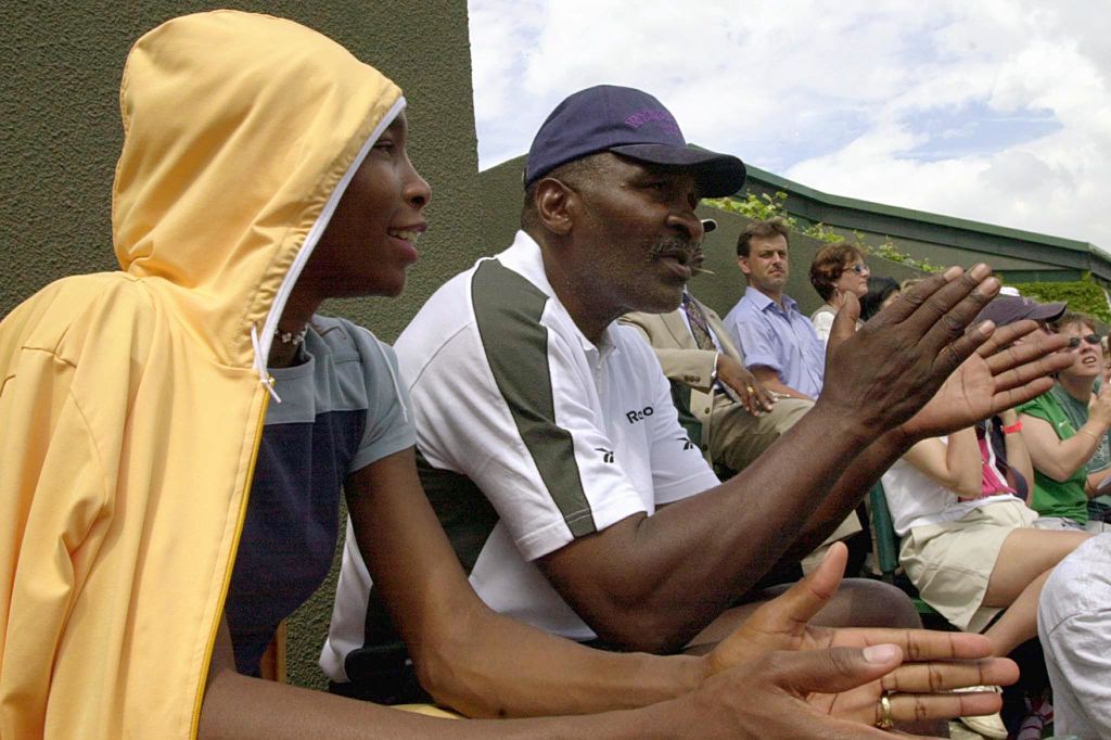 US Venus Williams (L) wearing a jacket's hood agai