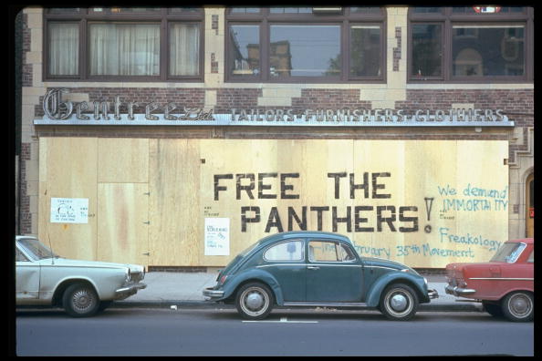 Writing on boarded-up store fronts readi