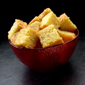 Cornbread cut into cubes in a bowl - New Year Traditions