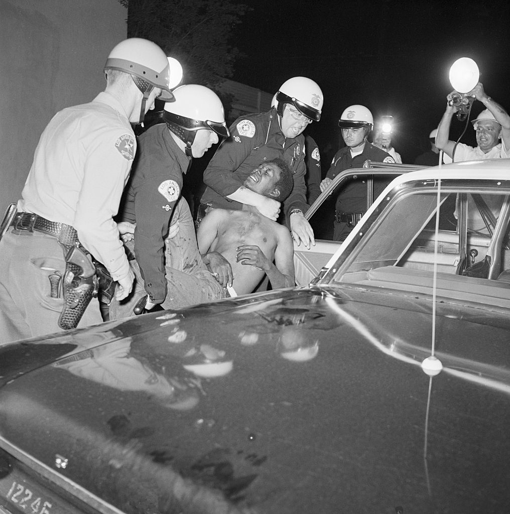African American Rioter Being Forcefully Arrest