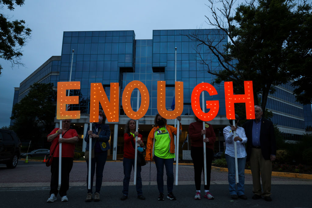 Vigil Held For Uvalde Shooting Victims Outside NRA Headquarters In Virginia