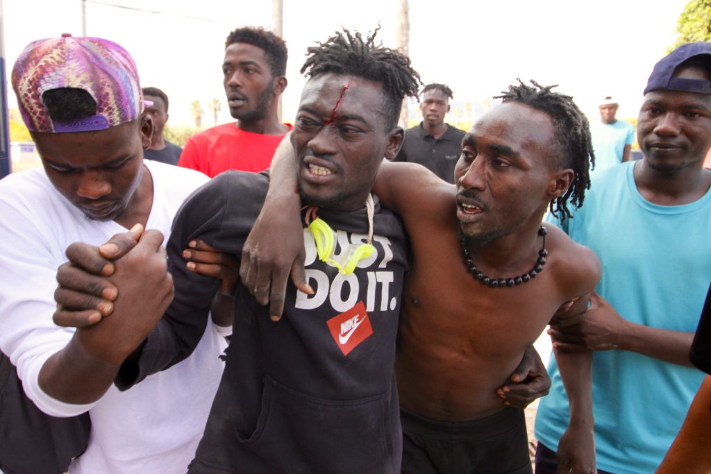 Hundreds Of Migrants Jump Melilla's Fence By Breaking Through The Gate Of The Chinatown Border Post