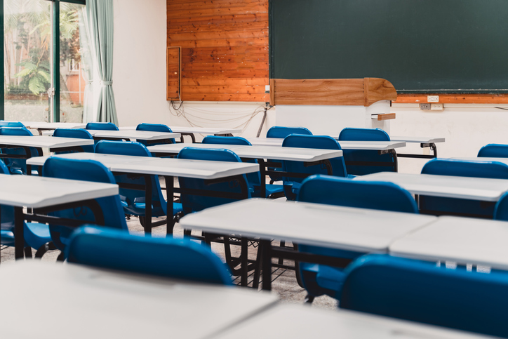 Empty classroom interior with modern desk and seat