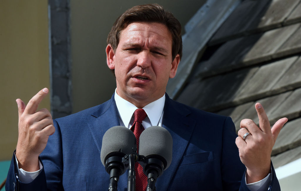 Florida Gov. Ron DeSantis speaks at a press conference to...