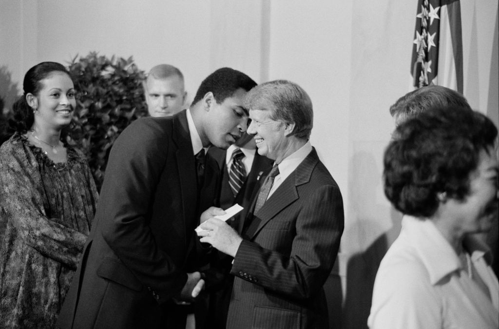 US President Jimmy Carter greets Mohammed Ali at White House Dinner celebrating the signing of the Panama Canal Treaty, Washington