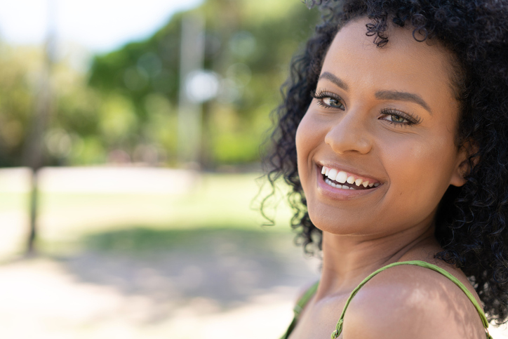 Portrait of afro woman with green eyes