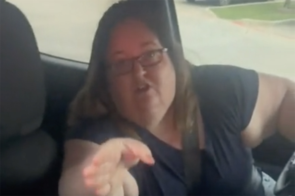 social media video of "Karen" being racist while parking a car