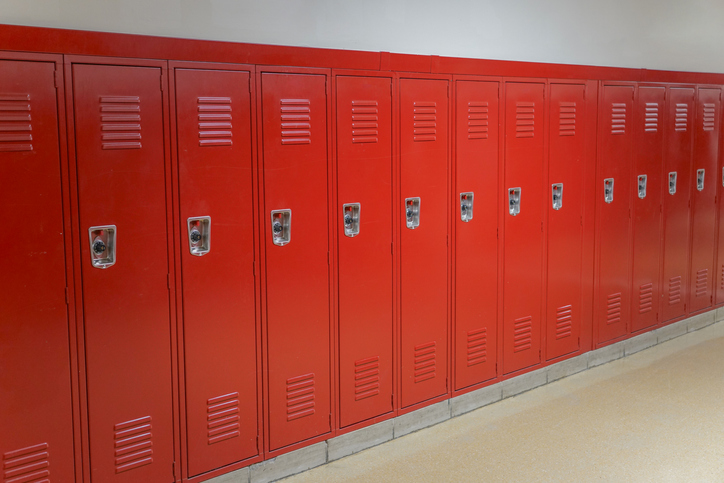 close up on red lockers in the school