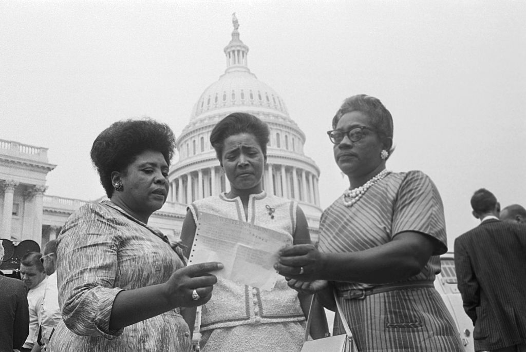 Civil Rights Demonstrators Holding Legal Document