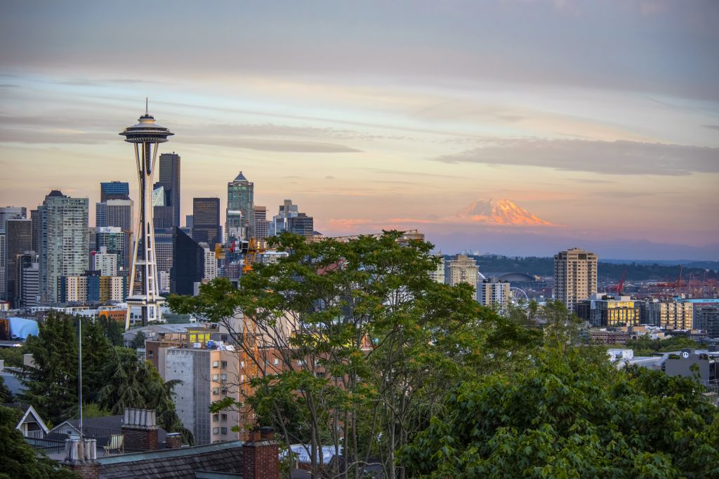 Seattle and Mount Rainier in late Summer Alpenglow. Seattle, Washington, United States of America