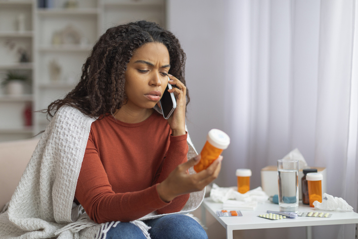 Fear, Mistrust, Study, Black, Commuity Young Black Woman Consulting With Doctor Over Phone Regarding Medication