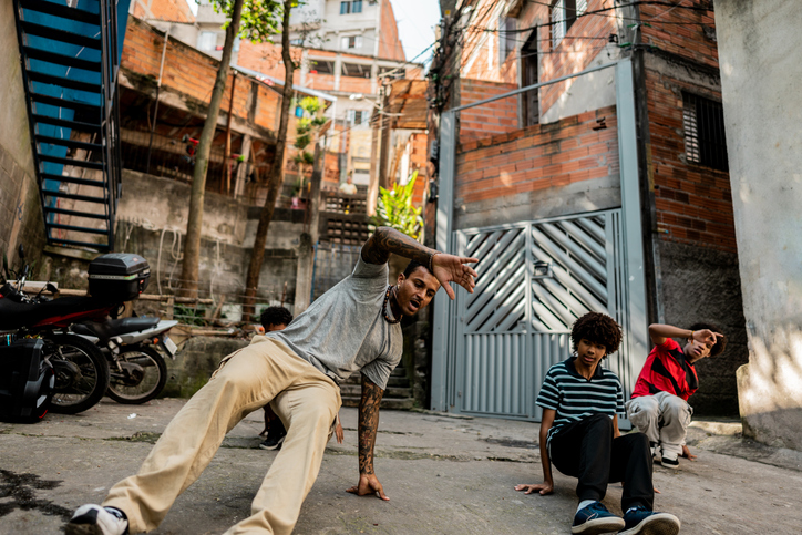 Breakdancers dancing outdoors