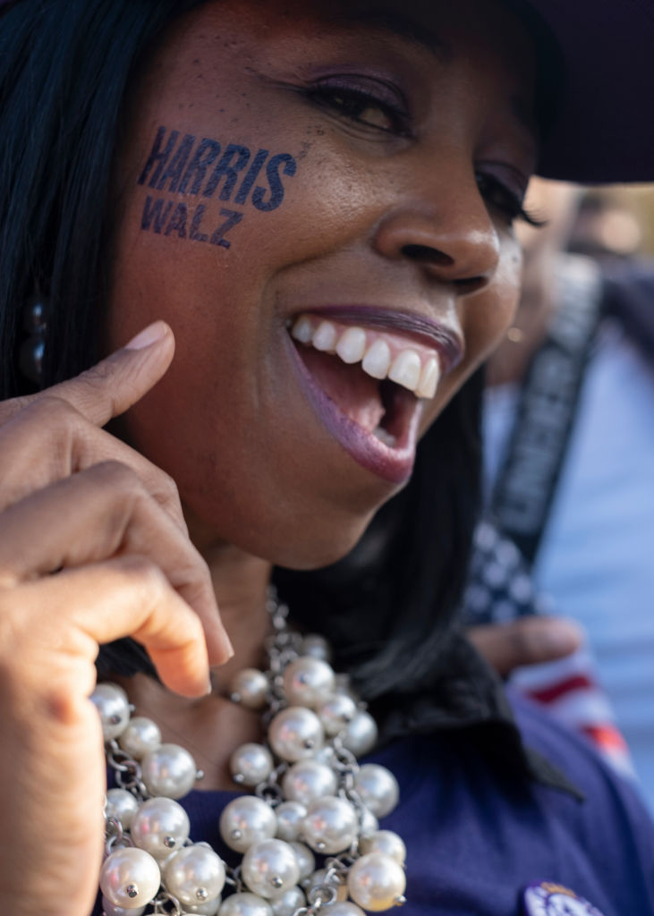 A supporter of Democratic presidential nominee Kamala Harris...