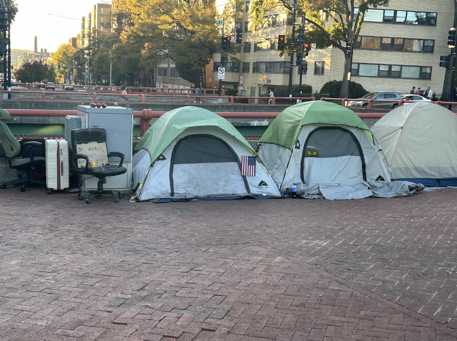Tents on intersection of Washington Circle NW and K ST NW located by Foggy Bottoms metro.