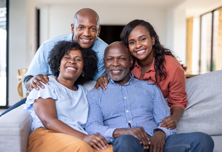 Two generation family smiling at home - Black holiday 