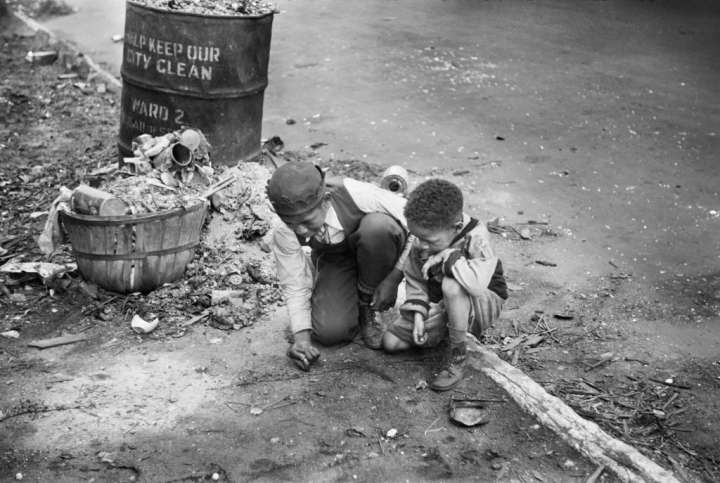 Two Boys playing on Street, Black Belt, Chicago, Illinois, USA, Edwin Rosskam, U.S. Office of War Information/U.S. Farm Security Administration, April 1941