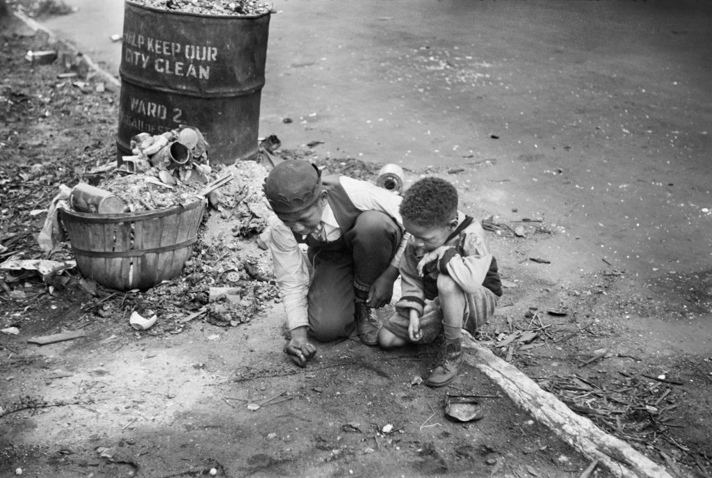 Two Boys playing on Street, Black Belt, Chicago, Illinois, USA, Edwin Rosskam, U.S. Office of War Information/U.S. Farm Security Administration, April 1941