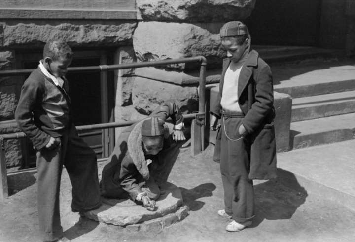 Boys Playing Marbles