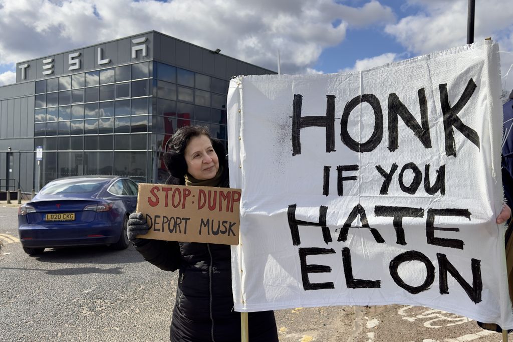 Protest outside Tesla dealership in London