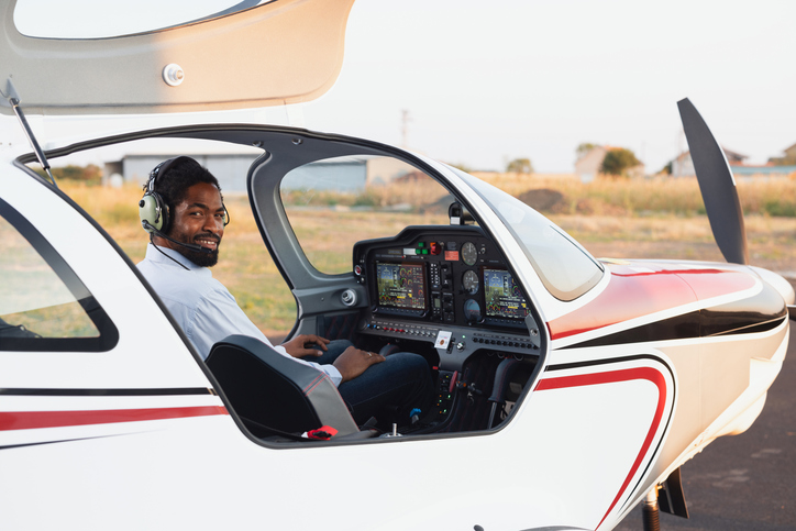 African American pilot in the jet is preparing for departure