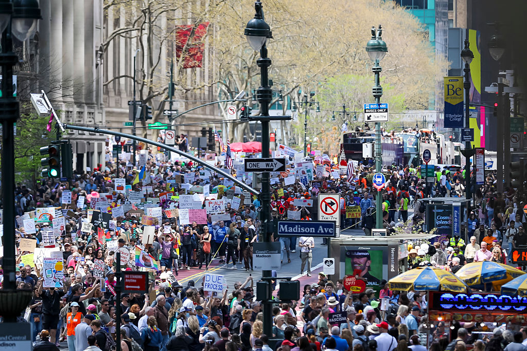 Tens of thousands participate in the 'Protect Migrants,...