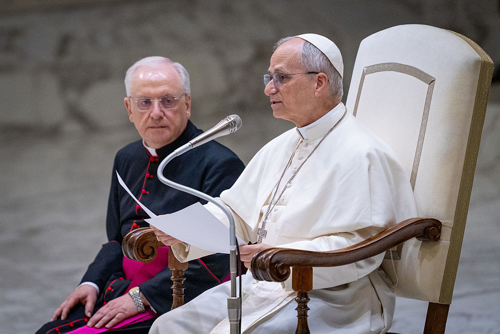 Pope Leo XIV delivers his speech during a meeting with...