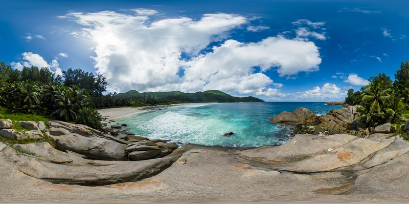Rocky coastline under bright sun. Mahe, Seychelles. Africa, Travel, Safety