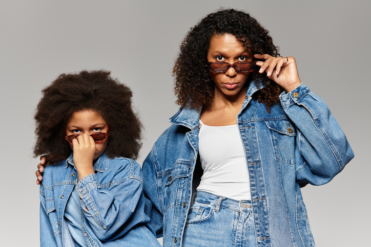 Denim dreams a mother and daughter share in matching outfits in studio