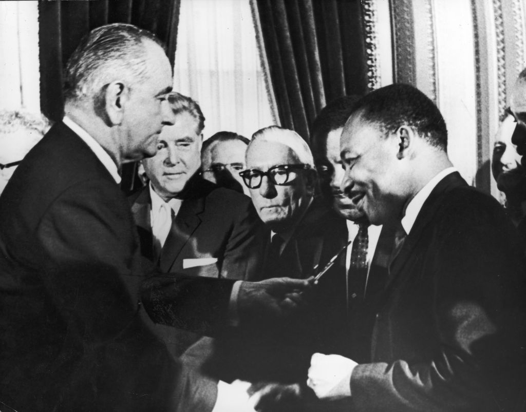 LBJ hands pen to MLK