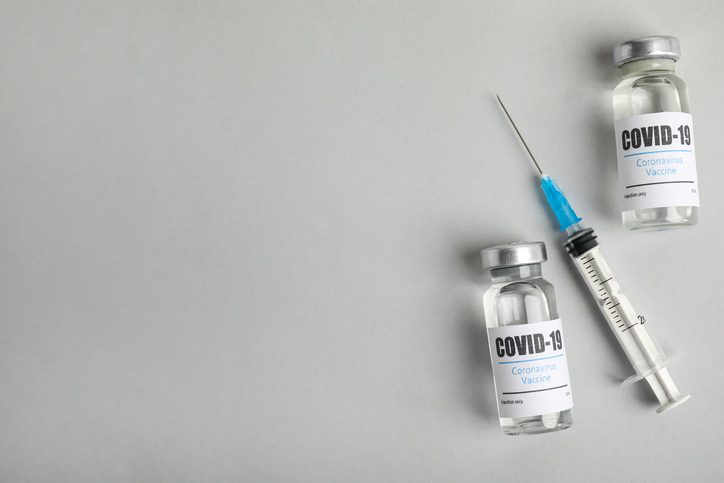 Coronavirus vaccine and syringe