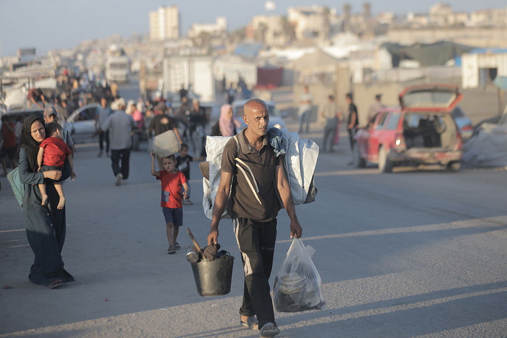 Palestinians who fled from north to south set up tents along the coast of Deir al-Balah