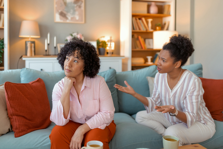 Tense Female Friends Arguing at Home