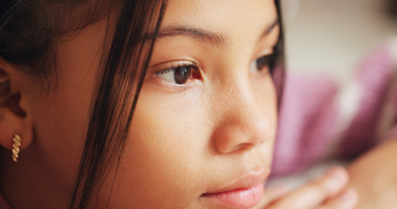 Sad, thinking and girl with depression, kid and abandon with anxiety, mental health and foster care trauma. Home, adoption and child with emotion, ptsd and stress with mistake, reflection and grief