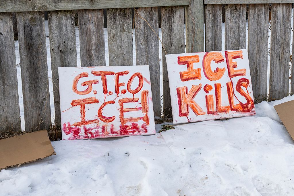 Anti-ice signs at the memorial site for Renee Good who was shot by an Immigration and Customs Enforcement officer in Minneapolis, Minnesota